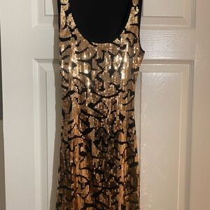 Beautiful short, black and gold sequin dress